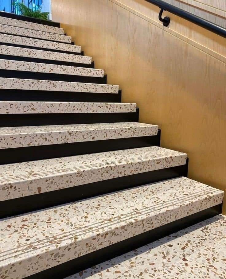 Gripora anti-skid granite staircase application — terrazzo speckle pattern